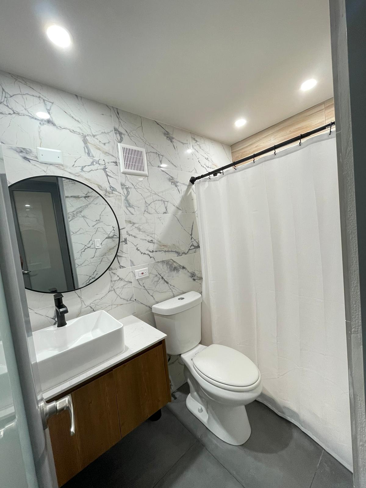 Guest bathroom with modern fixtures at VillaMar Fajardo in Villa Marina, Fajardo
