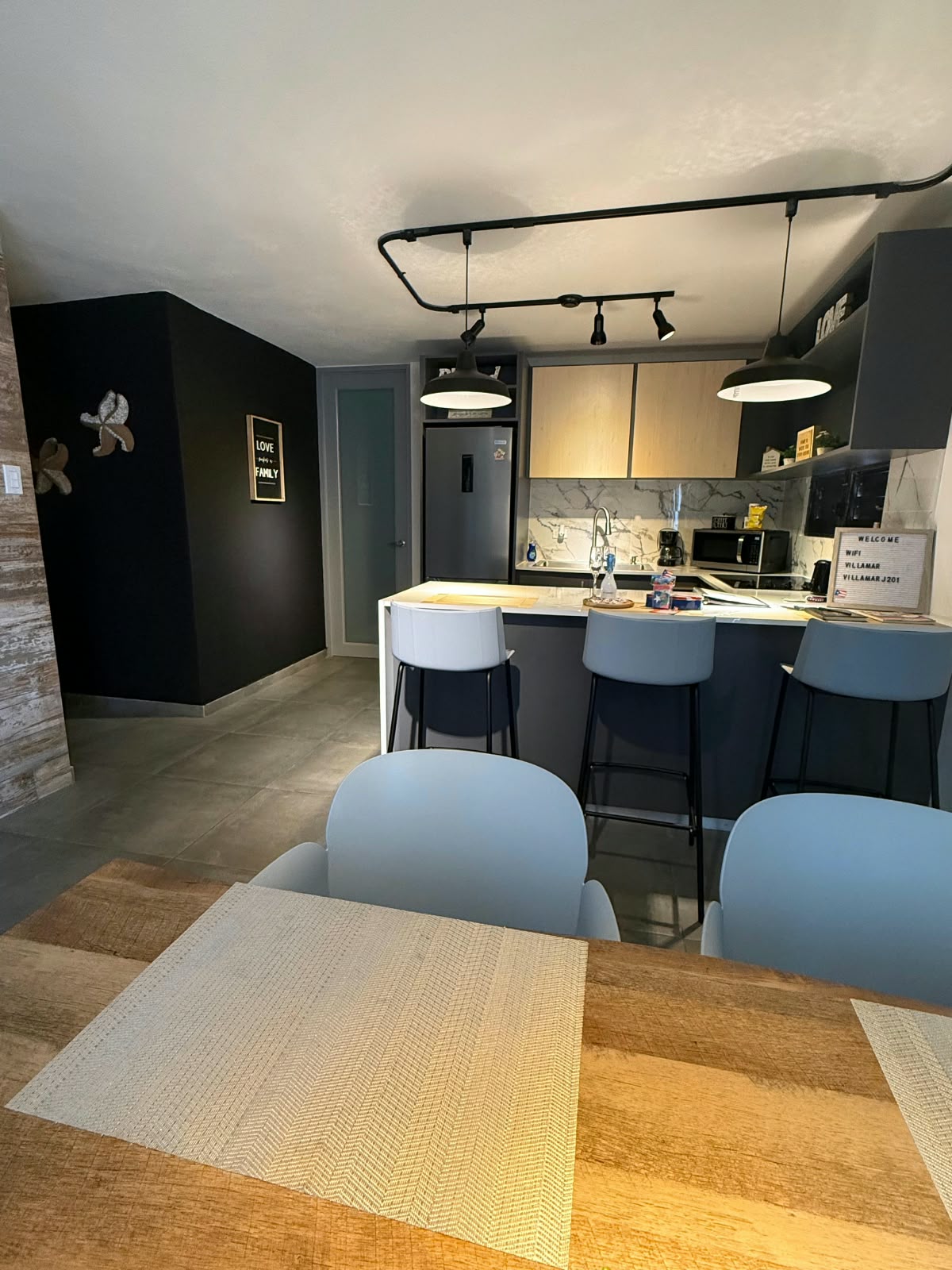Modern kitchen and dining area at VillaMar Fajardo vacation rental